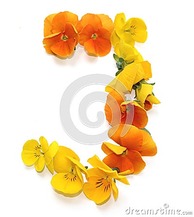 natural flower arrangements with yellow orange real fresh flowers letter J Stock Photo