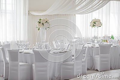 Flower arrangements on the tables Stock Photo