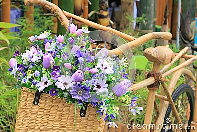Flower basket on bamboo bike Stock Photo