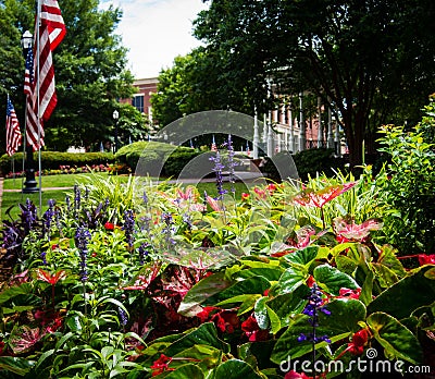 Flower bed and pavillon at Marietta Square in Georgia decorated for Independence Day Stock Photo