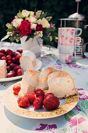 Flower bouquet of roses and angelfood cake Stock Photo