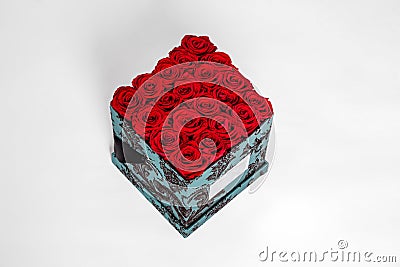 Flower box intended for home decor, weddings, anniversaries, birthdays and other celebrations. Red roses Stock Photo