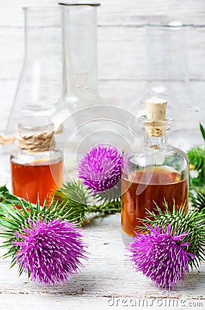 Flower and burdock extract Stock Photo