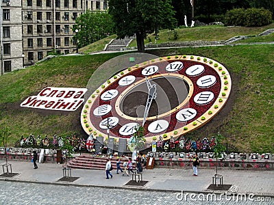 Flower clock with the inscription `Glory to Ukraine!` on Maidan Nezalezhnosti Editorial Stock Photo