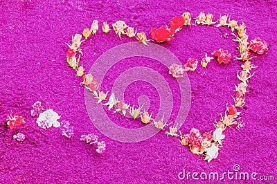 Flower heart shape on pink background Stock Photo