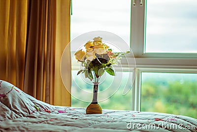 Flower vase on the couch Stock Photo