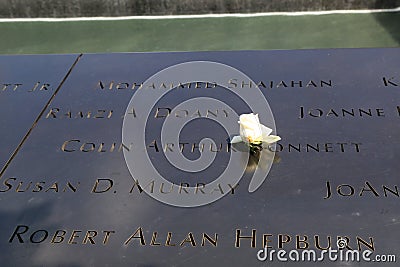 Flower left at the National September 11 Memorial at Ground Zero in Lower Manhattan Editorial Stock Photo