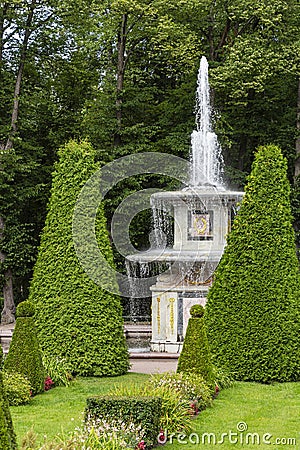 Flower parterre in front of the Roman fountain Editorial Stock Photo