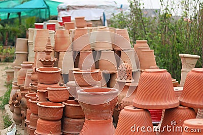 Flower and plant pots stacked at nursery for sale garden photography Stock Photo