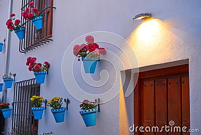 Flower pots in Granada Albaicin at sunset Stock Photo