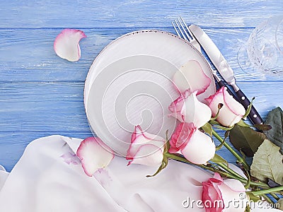 Flower rose plate vintage on wooden background Stock Photo