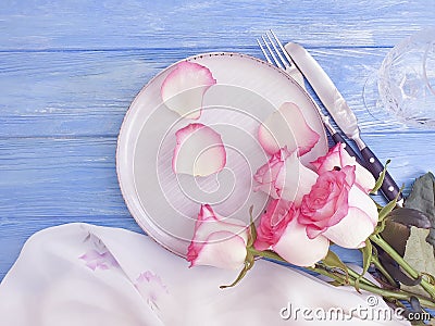 Flower rose plate wooden background Stock Photo