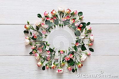 Flower shop background, roses circle on white wood Stock Photo