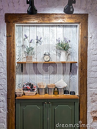 Flower vases, alarm clock, shelf in vintage Stock Photo