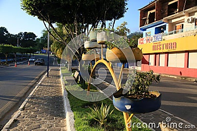 flowerbeds made with recycling Editorial Stock Photo