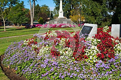 Flowerbeds and monuments on a town square Editorial Stock Photo
