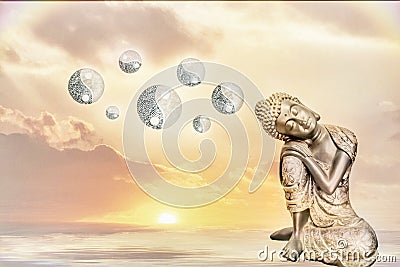 Meditation in the sunset with yin-yang Stock Photo