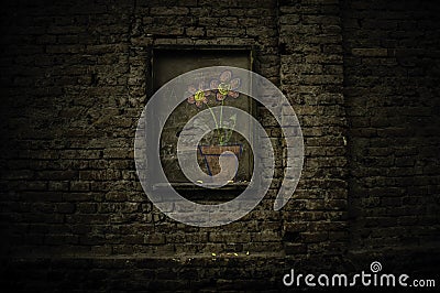 Flowers in the brick wall Editorial Stock Photo