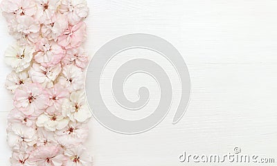 Flowers composition. Border made of flowers, flatlay, copy space, top view, desk Stock Photo