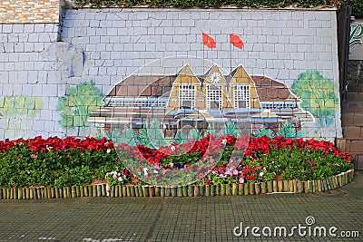 Flowers decoration on wall and street Editorial Stock Photo