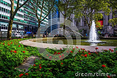 Flowers and fountains at Bowling Green, in Lower Manhattan, New Editorial Stock Photo
