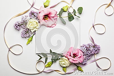 Flowers and invitation card Stock Photo