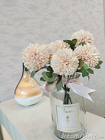 This flowers and light table ofice Stock Photo