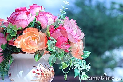 Flowers in a vase multiplicity paint outdoors in the garden Stock Photo