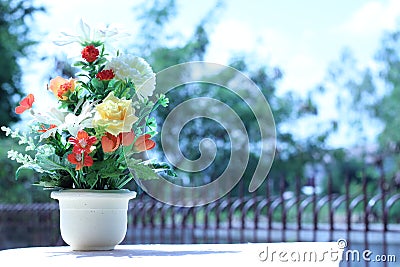 Flowers in a vase multiplicity paint outdoors in the garden Stock Photo