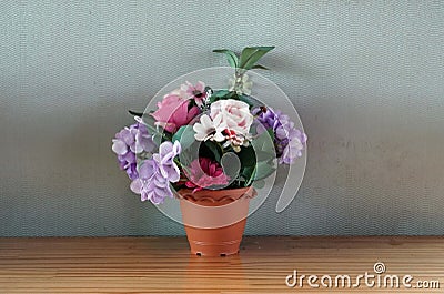 A flowers in a vase on a wooden table in the cafe, decoration concept Stock Photo