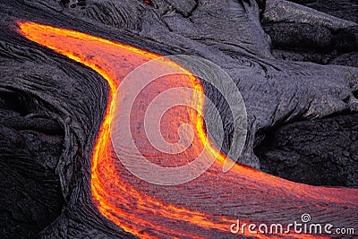 Flowing lava in Hawaii Stock Photo