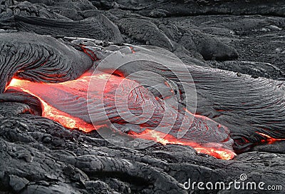 Flowing lava in Hawaii Stock Photo