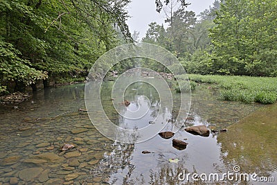 Flowing rocky creek clear clean water Stock Photo