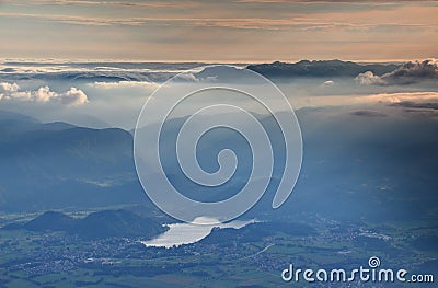 Sea of clouds, mist and sun rays at sunset, Lake Bled, Slovenia Stock Photo