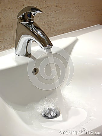 Flowing Water Faucet Stock Photo