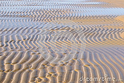 Flowing water at low tide Stock Photo