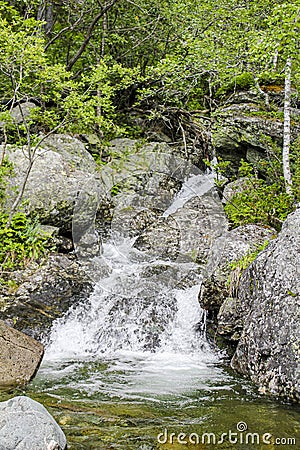 Flowing waterfall river Lake Hemsila in Hemsedal, Norway Stock Photo
