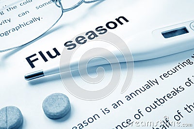 Flu season sign on a paper. Stock Photo