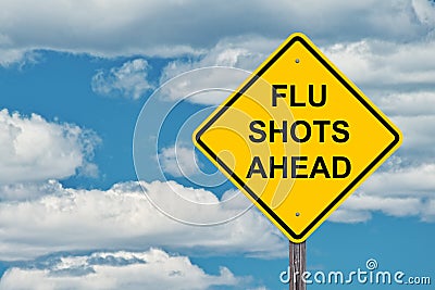 Flu Shots Ahead - Caution Sign Blue Sky Stock Photo