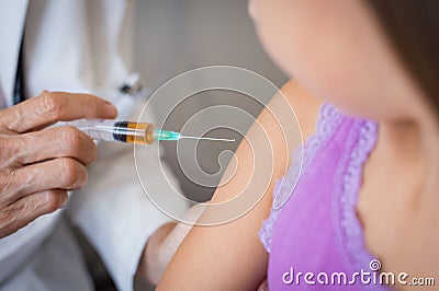 Flu vaccine to little girl Stock Photo