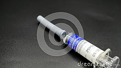 Flu vaccine vials, FLAUD from Novartis Vaccines and Diagnostics. currently very useful for excluding ambiguity with the Covid19 pa Editorial Stock Photo