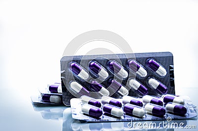 Fluconazole : Antifungal medicine. Heap of pills in blister packs on white background. Healthcare concept. Stock Photo