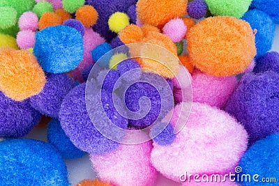 Fluffy colorful craft Pom Poms Stock Photo