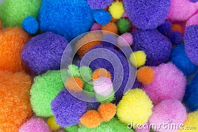 Fluffy colorful craft Pom Poms Stock Photo