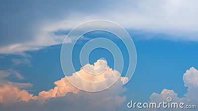 Fluffy cumulus in sunlight clouds in blues sky, colourful cloudy day. nature scenic background Stock Photo