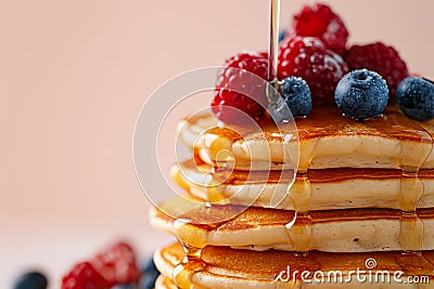 Fluffy Pancakes with Syrup and Berries - Delicious Breakfast Stack Stock Photo