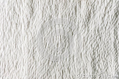 Fluffy plaid of polyester with a long heap gray. Comfortable home textiles. Background, texture Stock Photo