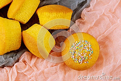 Fluffy sweet biscuit cupcakes. Top view Stock Photo