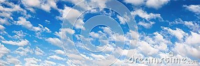 Fluffy white clouds on blue sky panorama Stock Photo