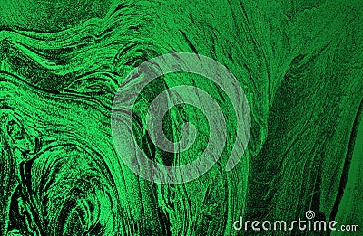Fluorescent colorful liquid inks background with gold glitter particles. Marble imitation. Stock Photo